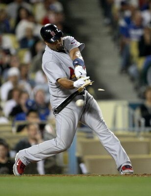 LOS ANGELES - AUGUST 18:  Albert Pujols #5 of the St. Louis Cardinals shatters his bat as he grounds out in the fourth inning against the Los Angeles Dodgers at Dodger Stadium August 18, 2009 in Los Angeles, California.   (Photo by Stephen Dunn/Getty Imag