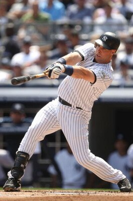NEW YORK - AUGUST 27:  Mark Teixeira  #25 of the New York Yankees gets a RBI hit in the first inning against the Texas Rangers during the MLB game on August 27, 2009 at Yankees Stadium in the Bronx borough of New York City. (Photo by Al Bello/Getty Images