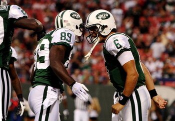 EAST RUTHERFORD, NJ - SEPTEMBER 3:  Quarterback MarkSanchez #6 and wide receiver Jerricho Cotchery #89 of the New York Jets celebrate a first quarter touchdown against the Philadelphia Eagles during the NFL preseason game at Giants Stadium on September 3,