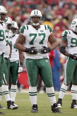 SAN FRANCISCO - DECEMBER 07:  Kris Jenkins #77 of the New York Jets stands on the field against the San Francisco 49ers during an NFL game on December 7, 2008 at Candlestick Park in San Francisco, California. (Photo by Jed Jacobsohn/Getty Images)