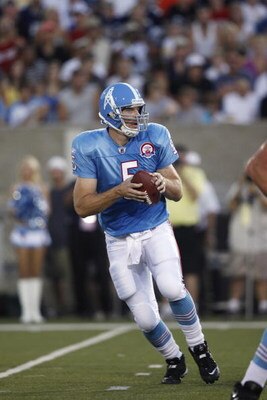 CANTON, OH - AUGUST 9: Kerry Collins #5 of the Tennessee Titans looks to pass the football against the Buffalo Bills during the Pro Football Hall of Fame Game at Fawcett Stadium on August 9, 2009 in Canton, Ohio. The Titans defeated the Bills 21-18. (Phot