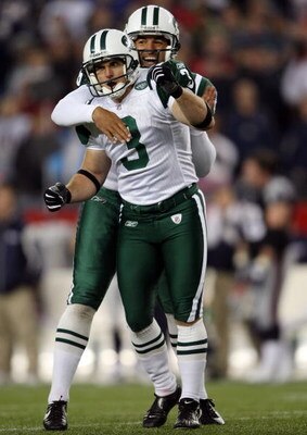FOXBORO, MA - NOVEMBER 13:  Jay Feely #3 of the New York Jets is congratulated by teammate Reggie Hodges #6 after Feely kicked the game winning field goal in overtime against the New England Patriots on November 13, 2008 at Gillette Stadium in Foxboro, Ma