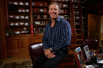 DENVER - JUNE 21:  John Elway poses at his home on June 21, 2005 in Denver, Colorado. (Photo by Doug Pensinger/Getty Images for Octagon)