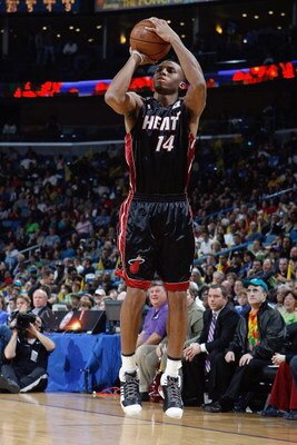 NEW ORLEANS - JANUARY 11:  Daequan Cook #14 of the Miami Heat takes a jump shot against the New Orleans Hornets on January 11, 2008 at the New Orleans Arena in New Orleans, Louisiana. The Hornets won 114-88. NOTE TO USER: User expressly acknowledges and a
