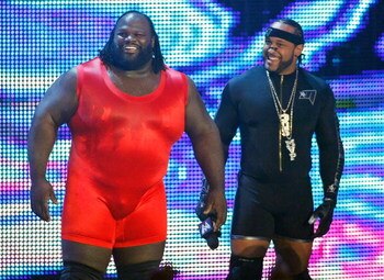 LAS VEGAS - AUGUST 24:  Wrestlers Mark Henry (L) and MVP are introduced during the WWE Monday Night Raw show at the Thomas & Mack Center August 24, 2009 in Las Vegas, Nevada.  (Photo by Ethan Miller/Getty Images)