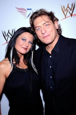 HOLLYWOOD - AUGUST 21:  Wrestlers Katie Lee and  William Regal arrive at the WWE's SummerSlam Kickoff Party at H-Wood Club on August 21, 2009 in Hollywood, California.  (Photo by Frazer Harrison/Getty Images)