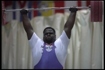 Mar 1995:  Mark Henry of the USA finishes a lift during the 1995 Pan American Games in Mar Del Plata, Argentina.  Mandatory Credit:  Pascal Rondeau/Allsport