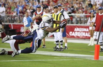 GLENDALE, AZ - AUGUST 22: Running back Michael Bennett #29 of the San Diego Chargers leaps for the touchdown in the second quarter during the game against  the Arizona Cardinals at the University of Phoenix Stadium on August 22, 2009 in Glendale, Arizona.