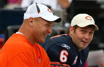 CHICAGO - OCTOBER 04: Injured linebacker Brian Urlacher #54 of the Chicago Bears laughs with Jay Cutler #6 on the bench during a game against the Detroit Lions on October 4, 2009 at Soldier Field in Chicago, Illinois. The Bears defeated the Lions 48-24. (