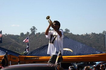 SAN DIEGO - SEPTEMBER 07:  A Chargers fan blows his trumpet in the parking lot before the game  between the Carolina Panthers the San Diego Chargers on September 7, 2008 at Qualcomm Stadium in San Diego, California.  The Panthers won 26-24.  (Photo by Ste