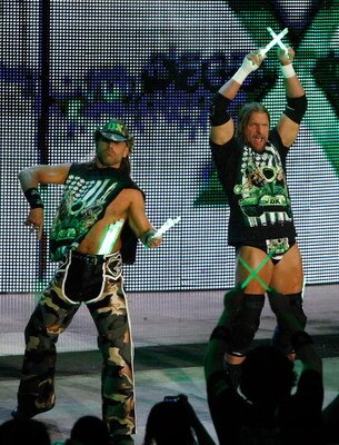 LAS VEGAS - AUGUST 24:  Wrestlers and tag team partners Shawn Michaels (L) and Triple H are introduced during the WWE Monday Night Raw show at the Thomas & Mack Center August 24, 2009 in Las Vegas, Nevada.  (Photo by Ethan Miller/Getty Images)