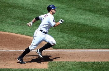 NEW YORK - JULY 12:  David Wright #5 of the New York Mets scores a run in the third inning against the Cincinnati Reds on July 12, 2009 at Citi Field in the Flushing neighborhood of the Queens borough of New York City.  (Photo by Jim McIsaac/Getty Images)