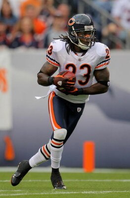 DENVER - AUGUST 30:  Kick returner Devin Hester #23 of the Chicago Bears recieves a kick off against the Denver Broncos during preseason NFL action at INVESCO Field at Mile High on August 30, 2009 in Denver, Colorado. The Bears defeated the Broncos 27-17.