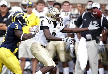 ANN ARBOR, MI - SEPTEMBER 05:  Ansel Ponder #8 of the Western Michigan Broncos can't make the catch in front of Stevie Brown #3 of the Michigan Wolverines on September 5, 2009 at Michigan Stadium in Ann Arbor, Michigan.  (Photo by Gregory Shamus/Getty Ima