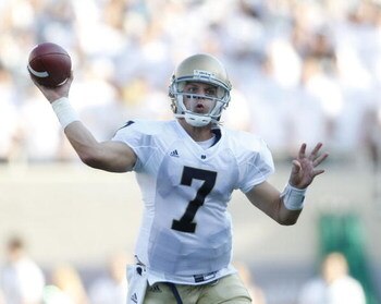 EAST LANSING, MI - SEPTEMBER 20:  Jimmy Clausen #7 of the Notre Dame Fighting Irish drops back to pass against the Michigan State Spartans on September 20, 2008 at Spartan Stadium in East Lansing, Michigan. MSU won the game 23-7.  (Photo by Leon Halip/Get