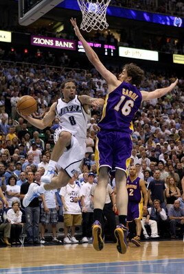 SALT LAKE CITY - MAY 16:  Deron Williams #8 of the Utah Jazz looks to pass the ball around Pau Gasol #16 of the Los Angeles Lakers in Game Six of the Western Conference Semifinals during the 2008 NBA Playoffs at EnergySolutions Arena on May 16, 2008 in Sa