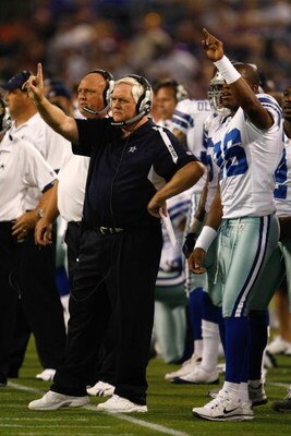 MINNEAPOLIS, MN - SEPTEMBER 4:  Head coach Wade Phillips of the Dallas Cowboys signals a play from the sidelines during action against the Minnesota Vikings at Hubert H. Humphrey Metrodome on September 4, 2009 in Minneapolis, Minnesota. The Cowboys defeat