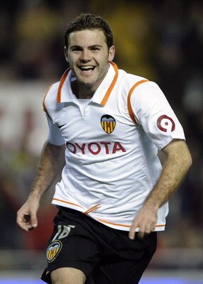 VALENCIA, SPAIN - MARCH 20:  Juan Mata of Valencia celebrates the third goal during the Copa del Rey Semi Final 2nd leg match between Valencia and Barcelona at the Mestalla stadium on March 20, 2008 in Valencia, Spain. Valencia won 3-2.  (Photo by Manuel 