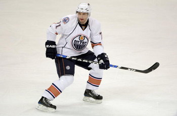 DENVER - JANUARY 16:  Lubomir Visnovsky #71 of the Edmonton Oilers skates against the Colorado Avalanche during NHL action at the Pepsi Center on January 16, 2009 in Denver, Coloado. The Oilers defeated the Avalanche 3-2.  (Photo by Doug Pensinger/Getty I