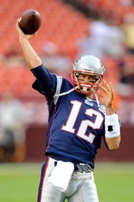 LANDOVER, MD - AUGUST 28:  Tom Brady #12 of the New England Patriots warms up before a preseason game against the Washington Redskins at FedExField on August 28, 2009 in Landover, Maryland.  (Photo by Greg Fiume/Getty Images)