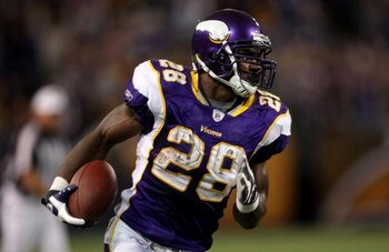 MINNEAPOLIS - NOVEMBER 09:  Adrian Peterson #29 of the Minnesota Vikings carries the ball on a 29 yard game winning touchdown run with 2:21 to play in the game against the Green Bay Packers on November 9, 2008 at the Metrodome in Mineapolis, Minnesota.  (