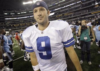 ARLINGTON, TX - AUGUST 21:  Quarterback Tony Romo #9 of the Dallas Cowboys walks off the field after the Cowboys beat the Tennessee Titans during a preseason game at Dallas Cowboys Stadium on August 21, 2009 in Arlington, Texas. (Photo by Tom Pennington/G