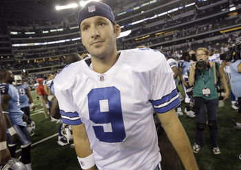 ARLINGTON, TX - AUGUST 21:  Quarterback Tony Romo #9 of the Dallas Cowboys walks off the field after the Cowboys beat the Tennessee Titans during a preseason game at Dallas Cowboys Stadium on August 21, 2009 in Arlington, Texas. (Photo by Tom Pennington/G