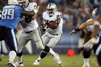 NASHVILLE, TN - AUGUST 15: Michael Bush #29 of the Oakland Raiders runs with the ball during the NFL pre-season game against the Tennessee Titans at LP Field August 15, 2008 in Nashville, Tennessee.  (Photo by Andy Lyons/Getty Images)