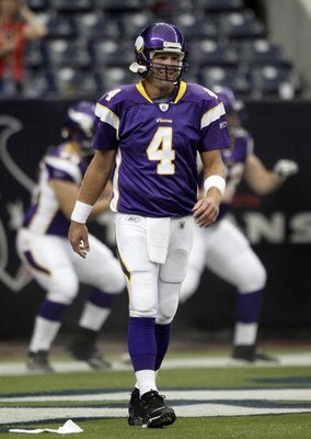 HOUSTON - AUGUST 31:  Quarterback Brett Favre #4 of the Minnesota Vikings looks on during pre-game warm-up prior to the preseasn game against the Houston Texans at Reliant Stadium on August 31, 2009 in Houston, Texas.  (Photo by Bob Levey/Getty Images)