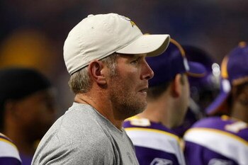 MINNEAPOLIS, MN - SEPTEMBER 4: Quarterback Brett Favre #4 of the Minnesota Vikings watches the game from the sidelines against the Dallas Cowboys at Hubert H. Humphrey Metrodome on September 4, 2009 in Minneapolis, Minnesota. (Photo by Scott Boehm/Getty I