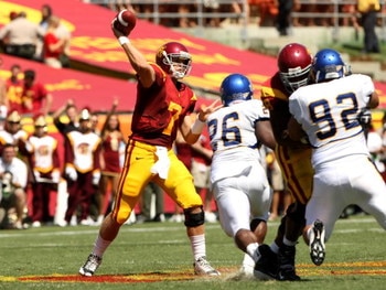 LOS ANGELES, CA - SEPTEMBER 05:  Quarterback Matt Barkley #7 of the USC Trojans throws a pass during the game against the San Jose State Spartans on September 5, 2009 at the Los Angeles Coliseum in Los Angeles, California.  The Trojans won 56-3.  (Photo b