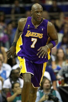 ORLANDO, FL - JUNE 14:  Lamar Odom #7 of the Los Angeles Lakers runs up court in the first half against the Orlando Magic in Game Five of the 2009 NBA Finals on June 14, 2009 at Amway Arena in Orlando, Florida.  NOTE TO USER:  User expressly acknowledges 