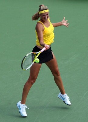 NEW YORK - AUGUST 31:  Victoria Azarenka of Belarus returns a shot against Alexandra Dulgheru of Romania during day one of the 2009 U.S. Open at the USTA Billie Jean King National Tennis Center on August 31, 2009 in Flushing neighborhood of the Queens bor
