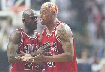 26 May 1997:  Guard Michael Jordan holds back forward Dennis Rodman of the Chicago Bulls as he argues with an official during a playoff game against the Miami Heat at the Miami Arean in Miami, Florida.  The Heat won the game 87-80. Mandatory Credit: Andy 