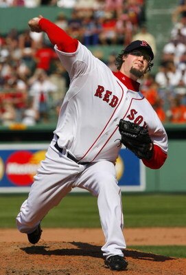 BOSTON - AUGUST 2:  Eric Gagne #83 of the Boston Red Sox pitches against the Baltimore Orioles on August 2, 2007 at Fenway Park in Boston, Massachusetts. (Photo by Jim Rogash/Getty Images)  