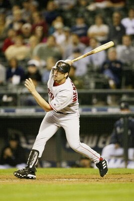 SEATTLE - SEPTEMBER 9:  Doug Mientkiewicz #13 of the Boston Red Sox bats against the Seattle Mariners during the game on September 9, 2004 at Safeco Field in Seattle, Washington.  (Photo by Otto Greule Jr/Getty Images)