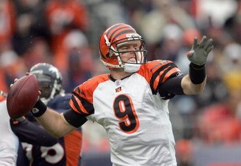 DENVER - DECEMBER 24:  Carson Palmer #9 of the Cincinnati Bengals passes the ball during the game against Denver Broncos, the Broncos defeated the Bengals 24-23 on December 24, 2006 at Invesco Field at Mile High in Denver, Colorado. (Photo by Doug Pensing
