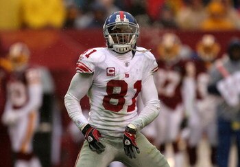 LANDOVER, MD - NOVEMBER 30:  Amani Toomer #81 of the New York Giants reacts to making a catch against the Washington Redskins during their game at FedEx Field on November 30, 2008 in Landover, Maryland.  (Photo by Streeter Lecka/Getty Images)