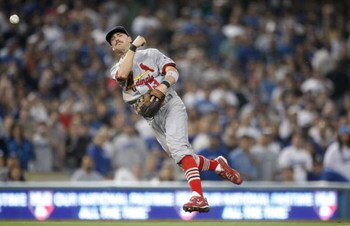 LOS ANGELES, CA - AUGUST 19:  Brendan Ryan #13 of the St. Louis Cardinals throws to first base during the game against the Los Angeles Dodgers at Dodger Stadium on August 19, 2009 in Los Angeles, California.  (Photo by Jeff Gross/Getty Images)