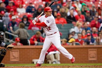 ST. LOUIS - APRIL 9:  David Freese #12 of the St. Louis Cardinals stands at bat during the MLB game against the Pittsburgh Pirates on April 9, 2009 at Busch Stadium in St. Louis, Missouri.  The Cardinals defeated the Pirates 2-1.  (Photo by Dilip Vishwana