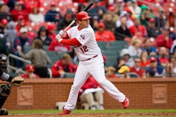 ST. LOUIS - APRIL 9:  David Freese #12 of the St. Louis Cardinals stands at bat during the MLB game against the Pittsburgh Pirates on April 9, 2009 at Busch Stadium in St. Louis, Missouri.  The Cardinals defeated the Pirates 2-1.  (Photo by Dilip Vishwana