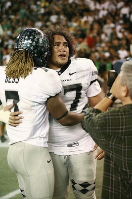 HONOLULU - DECEMBER 2:  Siave Seti #97 of the Hawaii Warriors and Devon Bess #7  celebrate the victory against the Washington Huskies on December 1, 2007 at Aloha Stadium in Honolulu, Hawaii.  Hawaii won 35-28 and finished the season undefeated at 12-0.  