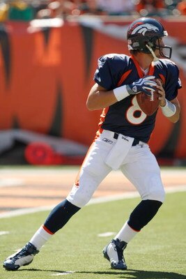 CINCINNATI, OH - SEPTEMBER 13:  Quarterback Kyle Orton #8 of the Denver Broncos drops back to pass the football against the Cincinnati Bengals at Paul Brown Stadium on September 13, 2009 in Cincinnati, Ohio. The Broncos defeated the Bengals 12-7. (Photo b