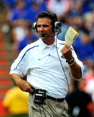 GAINESVILLE, FL - SEPTEMBER 12:  Head coach Urban Meyer of the Florida Gators watches the action during the game against the Troy Trojans at Ben Hill Griffin Stadium on September 12, 2009 in Gainesville, Florida.  (Photo by Sam Greenwood/Getty Images)