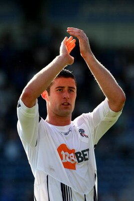 PORTSMOUTH, ENGLAND - SEPTEMBER 12: Gary Cahill of Bolton Wanderers applauds the Fans at the end of  the Barclays Premier League match between Portsmouth and Bolton Wanderers at Fratton Park on September 12, 2009 in Portsmouth, England.  (Photo by Phil Co