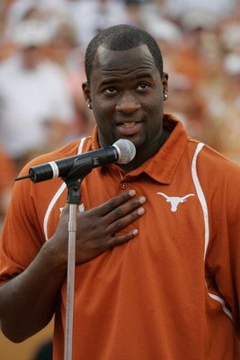 AUSTIN, TX - AUGUST 30:  Quarterback Vince Young of the Tennessee Titans speaks after his Texas Longhorns jersey number is retired before a game against the Florida Atlantic Owls at Darrell K Royal-Texas Memorial Stadium on August 30, 2007 in Austin, Texa