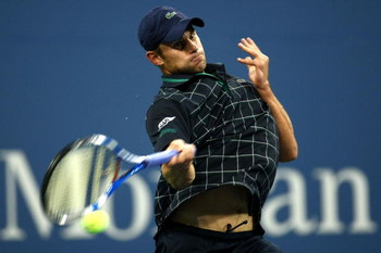NEW YORK - AUGUST 31: Andy Roddick returns a shot against Bjorn Phau of Germany during day one of the 2009 U.S. Open at the USTA Billie Jean King National Tennis Center on August 31, 2009 in Flushing neighborhood of the Queens borough of New York City.