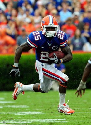 GAINESVILLE, FL - SEPTEMBER 12:  Brandon James #25 runs for a touchdown during the game against the Troy Trojans at Ben Hill Griffin Stadium on September 12, 2009 in Gainesville, Florida.  (Photo by Sam Greenwood/Getty Images)