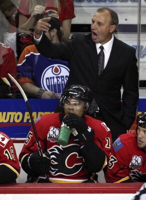 CALGARY, CANADA - SEPTEMBER 15: Head coach Brent Sutter of the Calgary Flames yells from the bench during the third period against the Edmonton Oilers in NHL preseason action on September 15, 2009 at the Pengrowth Saddledome in Calgary, Alberta, Canada. (