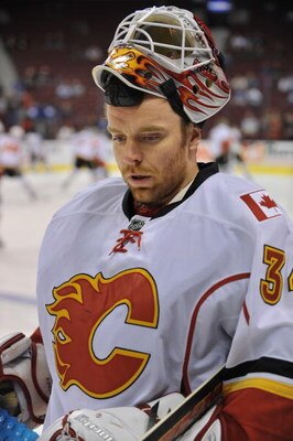 VANCOUVER, CANADA - APRIL 7: Miikka Kiprusoff #34 of the Calgary Flames looks on during their game against the Vancouver Canucks at General Motors Place April 7, 2009 in Vancouver, Canada.   (Photo by Nick Didlick/Getty Images)